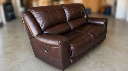 2 piece Ashley’s Furniture Leather Recliner Couches