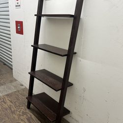 leaning bookcase 