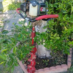 Earthquake auger post digger