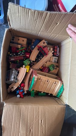 Big box of wooden train parts