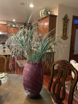 Vase with Green Leaves