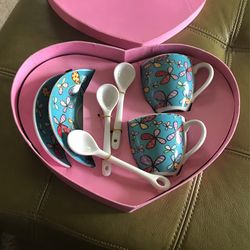 Expresso cups with saucer and spoons in heart shape box