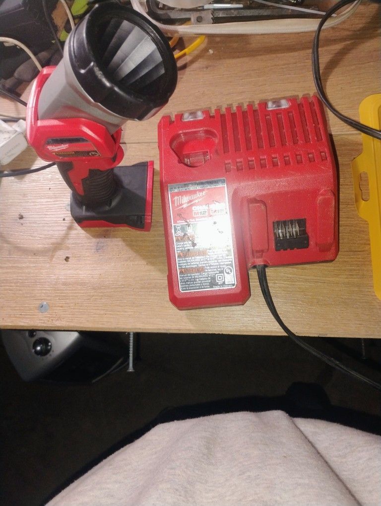 Milwaukee Charger And Flash Light