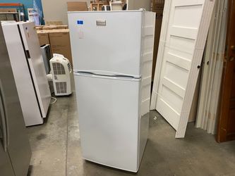 FRIGIDAIRE Medium Sized Refrigerator Freezer Model #FFTR1022QW1
