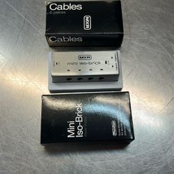 Dunlop Mini ISO-brick like new with six piece cable set
