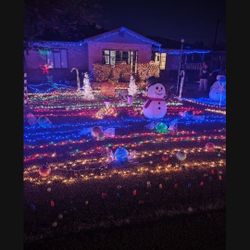 House Full Of Christmas Decorations And Lights