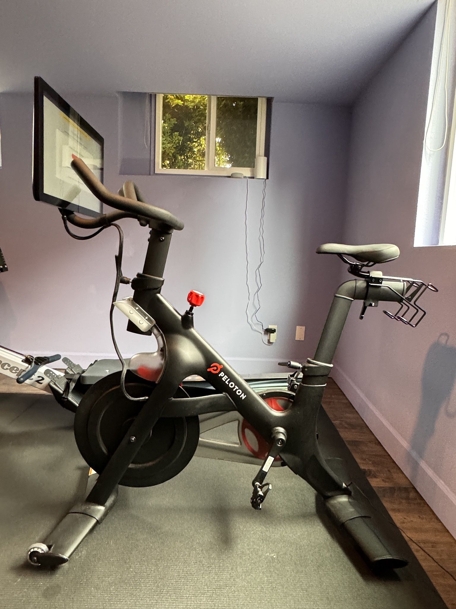Peloton Bike W/ Two Pairs Of Shoes (size 7 Women’s & 10.5 Men’s)