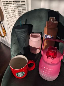 Used cups Starbucks and water bottles