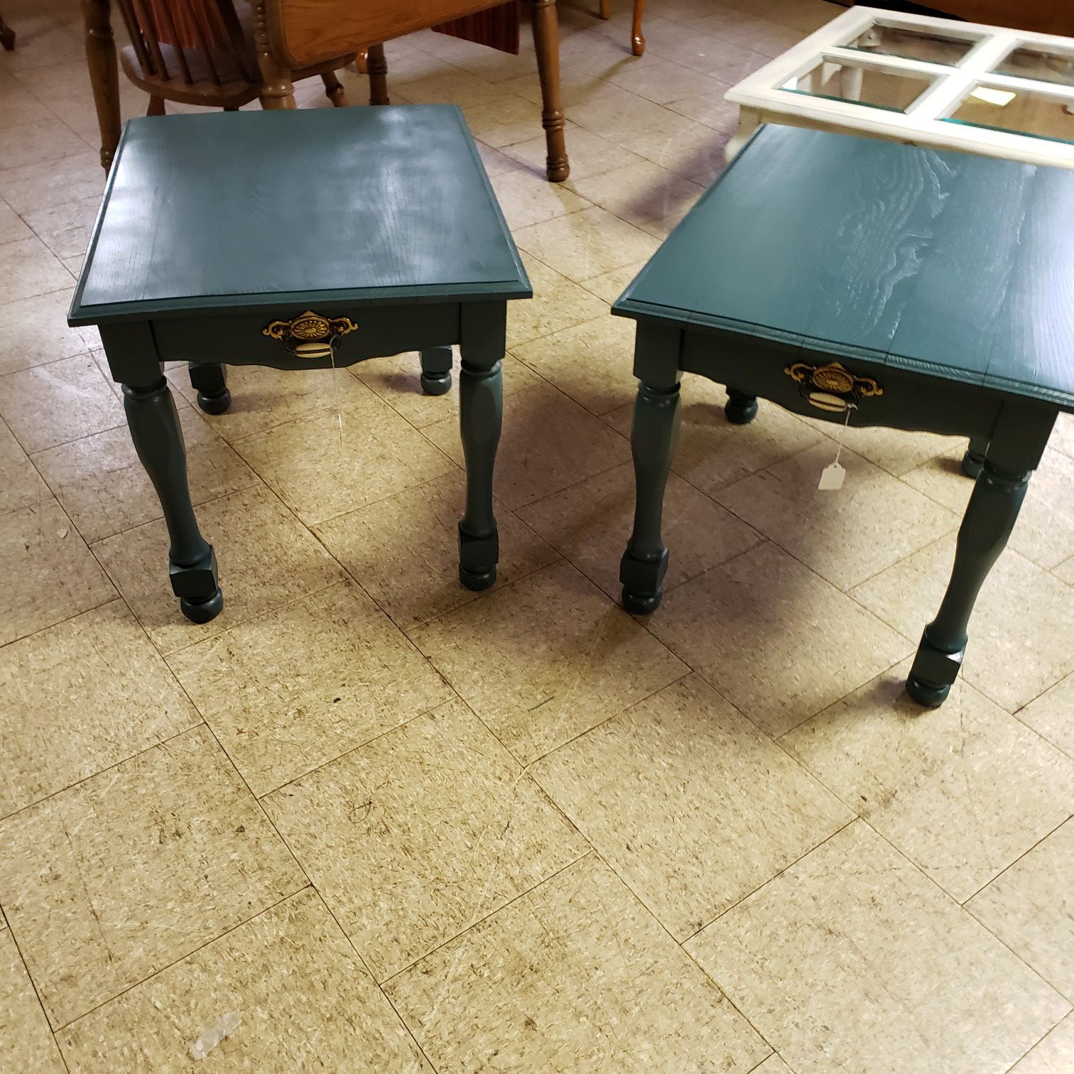 Antique green end tables.