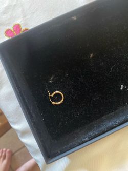 Single 14k hoop earring