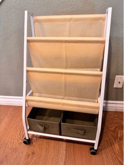 Child Toddlers book storage rack on wheels. Brand new. Assembled