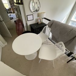 White Table And Two Chairs