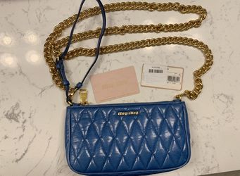 Miu Miu blue crossbody/wristlet bag