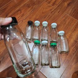 9 Clean Glass Bottles. 