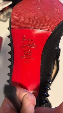 Studded red bottom booties