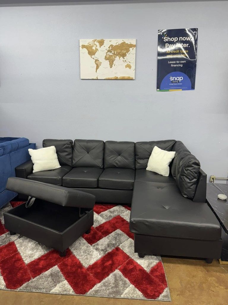 New In Boxes Black Faux Leather Sectional With Storage Ottoman 
