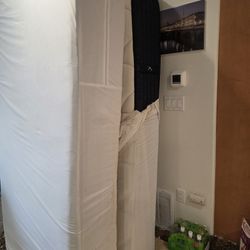Two Used Twin XL Mattresses by DreamCloud. Add up to King size