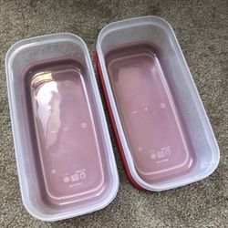 Two Rubbermaid Storage Containers