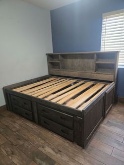 Full size captains storage bed