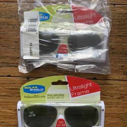 Solar shield polarized clip on sunglasses size 56 rec12 $10 each. New 