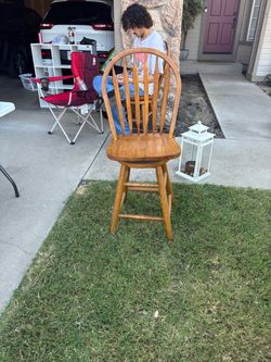 two real wood bar stools