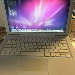 Genuine Apple MacBook A1181 13" Mid Mac OS Lion 2.4GHZ  Core 2 Duo 2GB RAM 160gb HDD