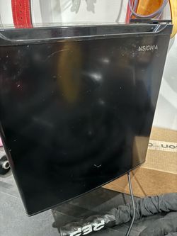 Black Insignia mini fridge