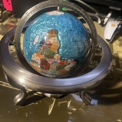 Silver globe compass