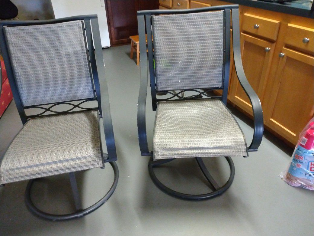 2  Swivel Patio Chairs