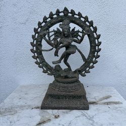 metal statue of Shiva Nataraja, the Hindu deity Shiva as the "Lord of Dance