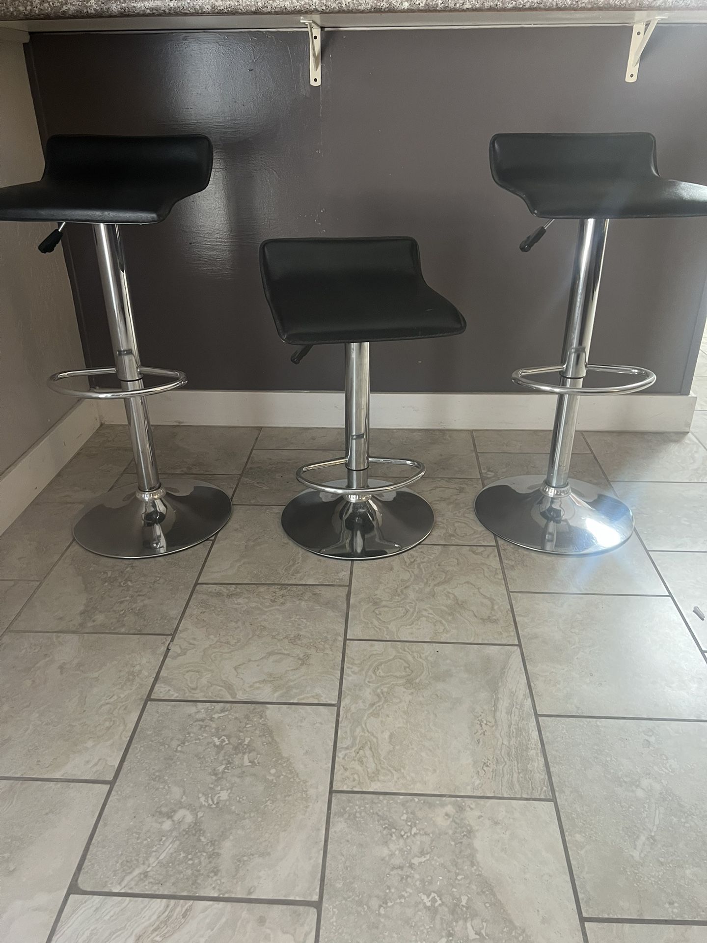 3 Chrome and Leather bar stools