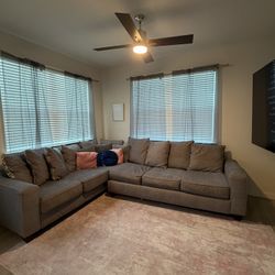 Gray Sectional Couch with Pull-Out Bed – Great Condition