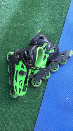 Black and Green Inline Roller Skates