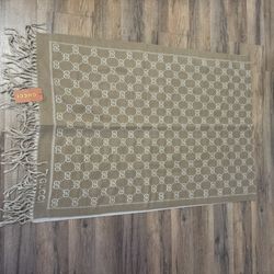 Tan Gucci scarf $150 