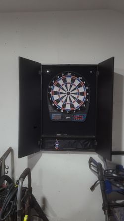 Dart board with cabinet