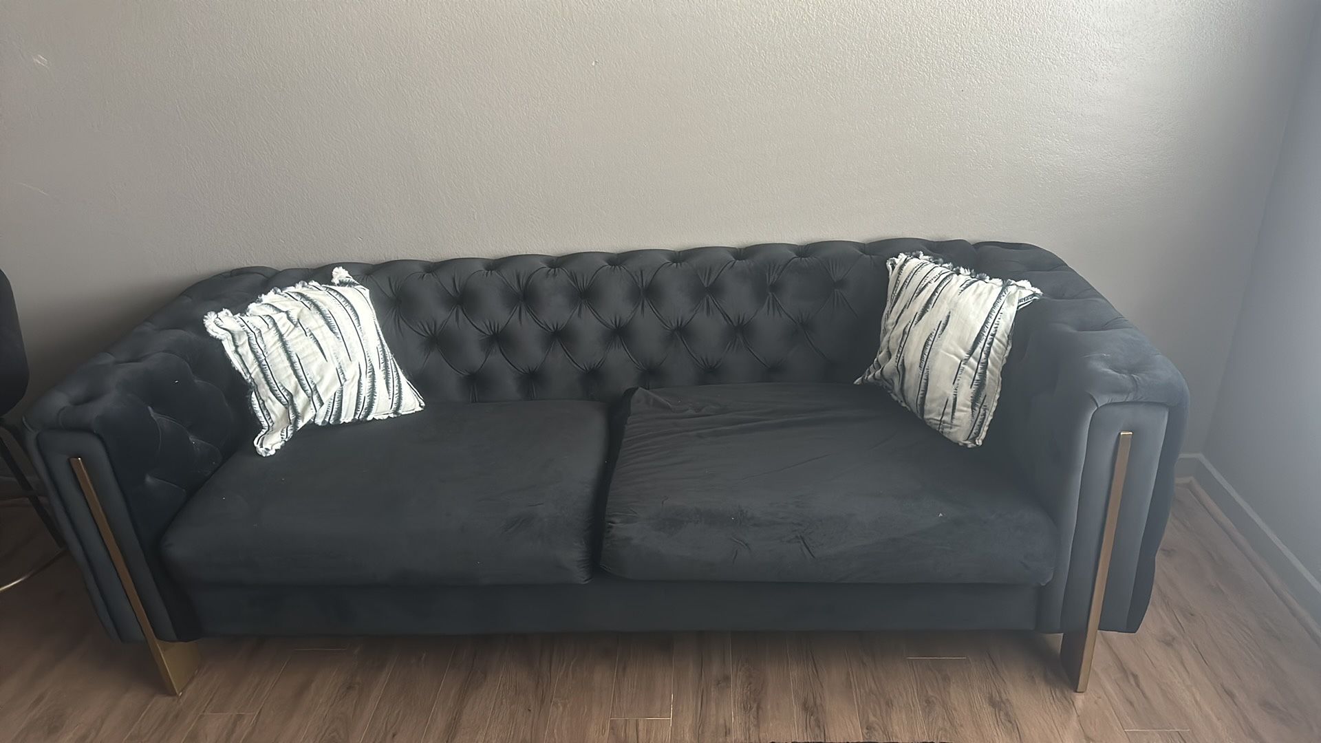 Black Tufted Sofa