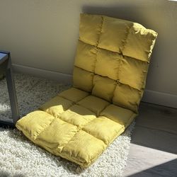 Adjustable recliner padded floor chair