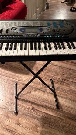Casio Electric Keyboard with Stand