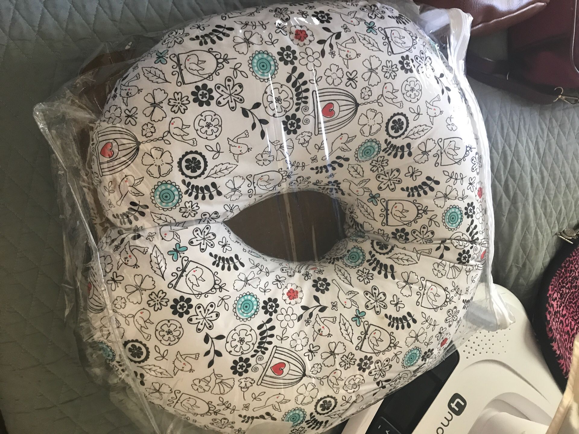 Boppy feeding and infant support pillow