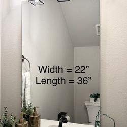 Bathroom mirror $20. Size 22” wide, 36” tall