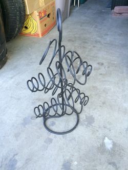 Black metal wine rack