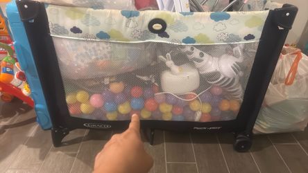Craco Pack n Play ball play stuff
