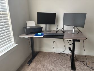 Electric Standing Desk with Black Frame and two monitors