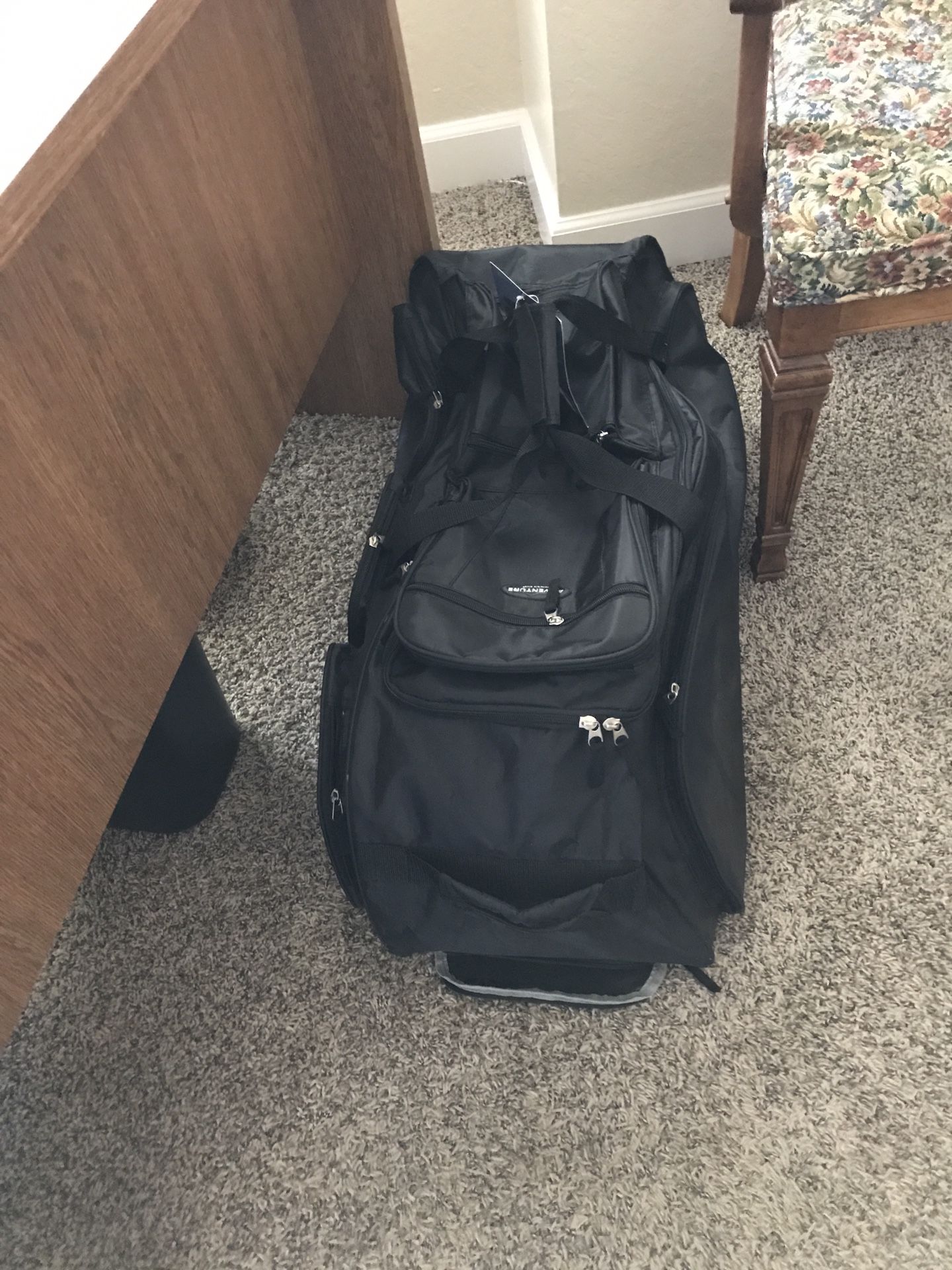 Brand new duffle bag on wheels. 30 inches