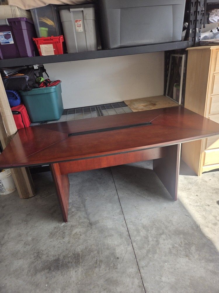 boat-shaped wood conference table