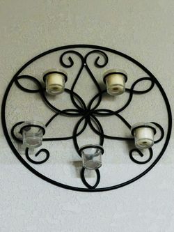 Flower Shaped Wall Decoration With 5 Candle Holders.