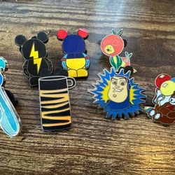 Assortment Of Seven Disney pins Pinbacks 