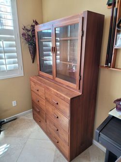 Solid walnut wood hutch China cabinet custom made with glass doors.