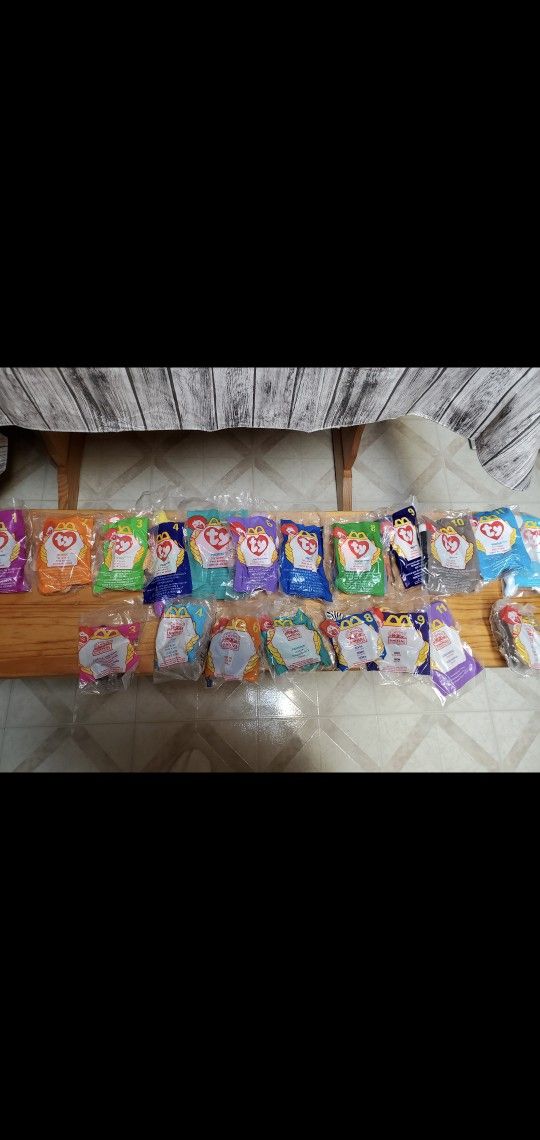 Complete NEW set of Ty Teenie Beanie Babies and Animal Kingdom.