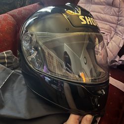 Flawless black glossy shoei motorcycle helmet
